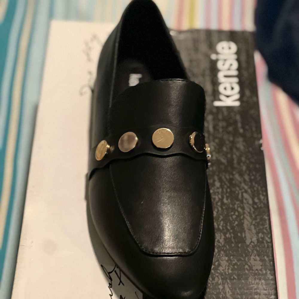 Kensie Ronin “smoking flats” with gold accents.